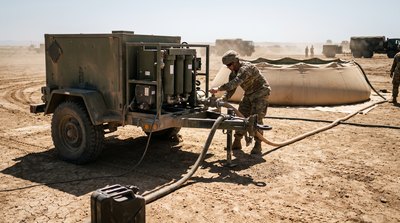 Trailer mounted military water purification unit deployed in the field